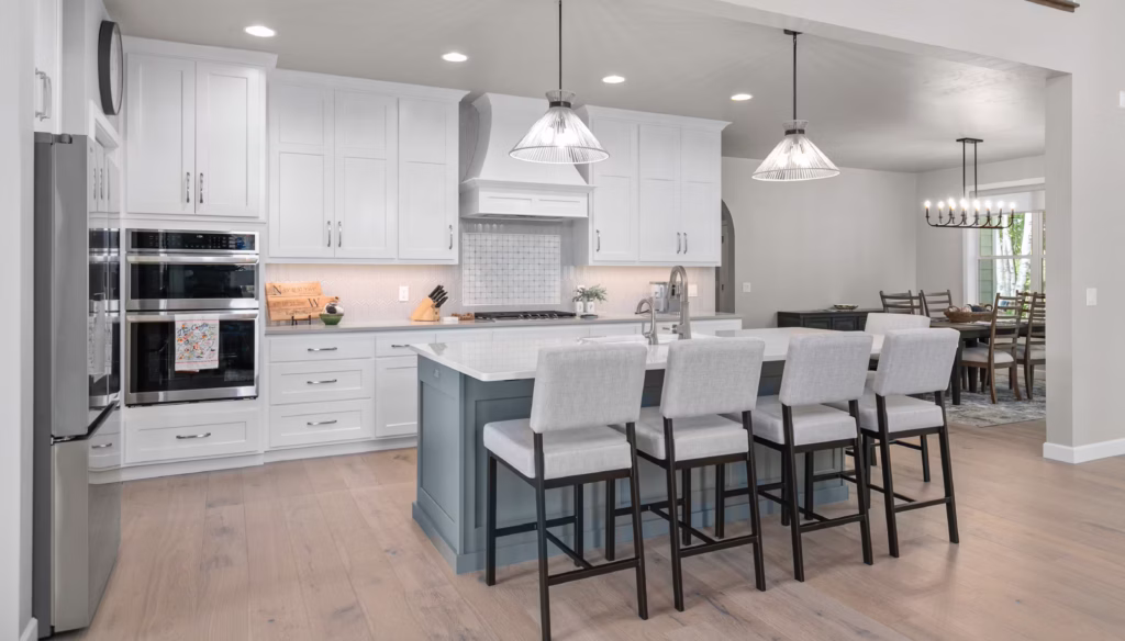 Interior designer assisting homeowners with furniture, color, and space planning decisions.