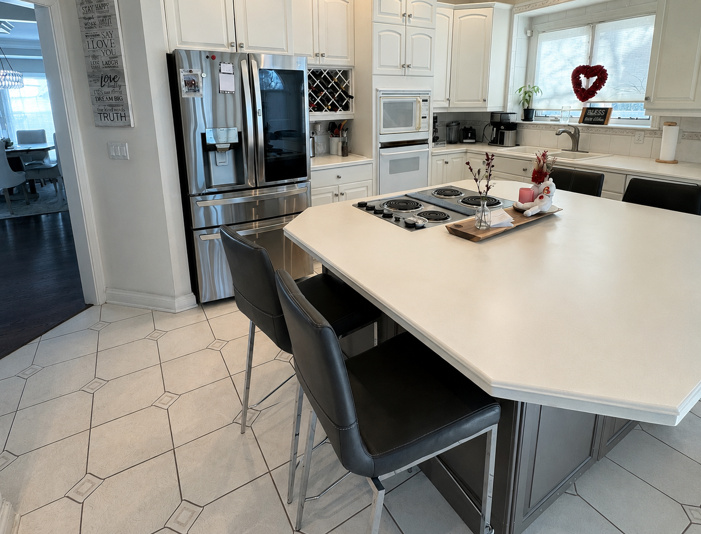 Before kitchen remodel in Lake in the Hills IL featuring traditional cabinetry, tile flooring, and an older kitchen layout