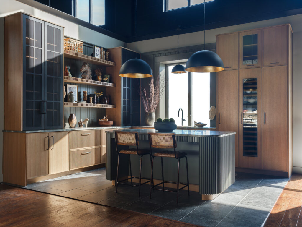 Non-Working Kitchen by Mouser Cabinetry featuring Pembroke Inset quarter-sawn cabinetry in Sand custom stain and Deep Creek island.