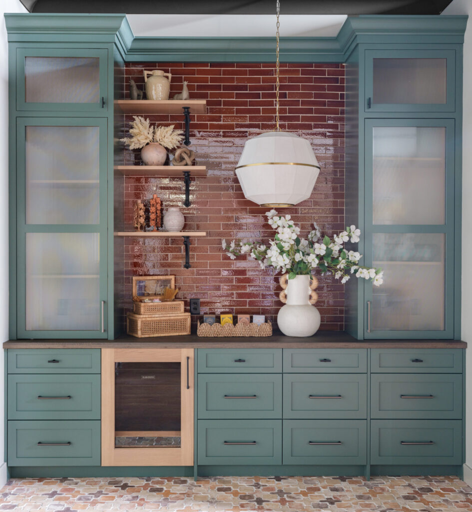 Custom coffee and beverage station featuring Amity cabinetry in Clover finish with quarter-sawn Cadet accents by Mouser Cabinetry.